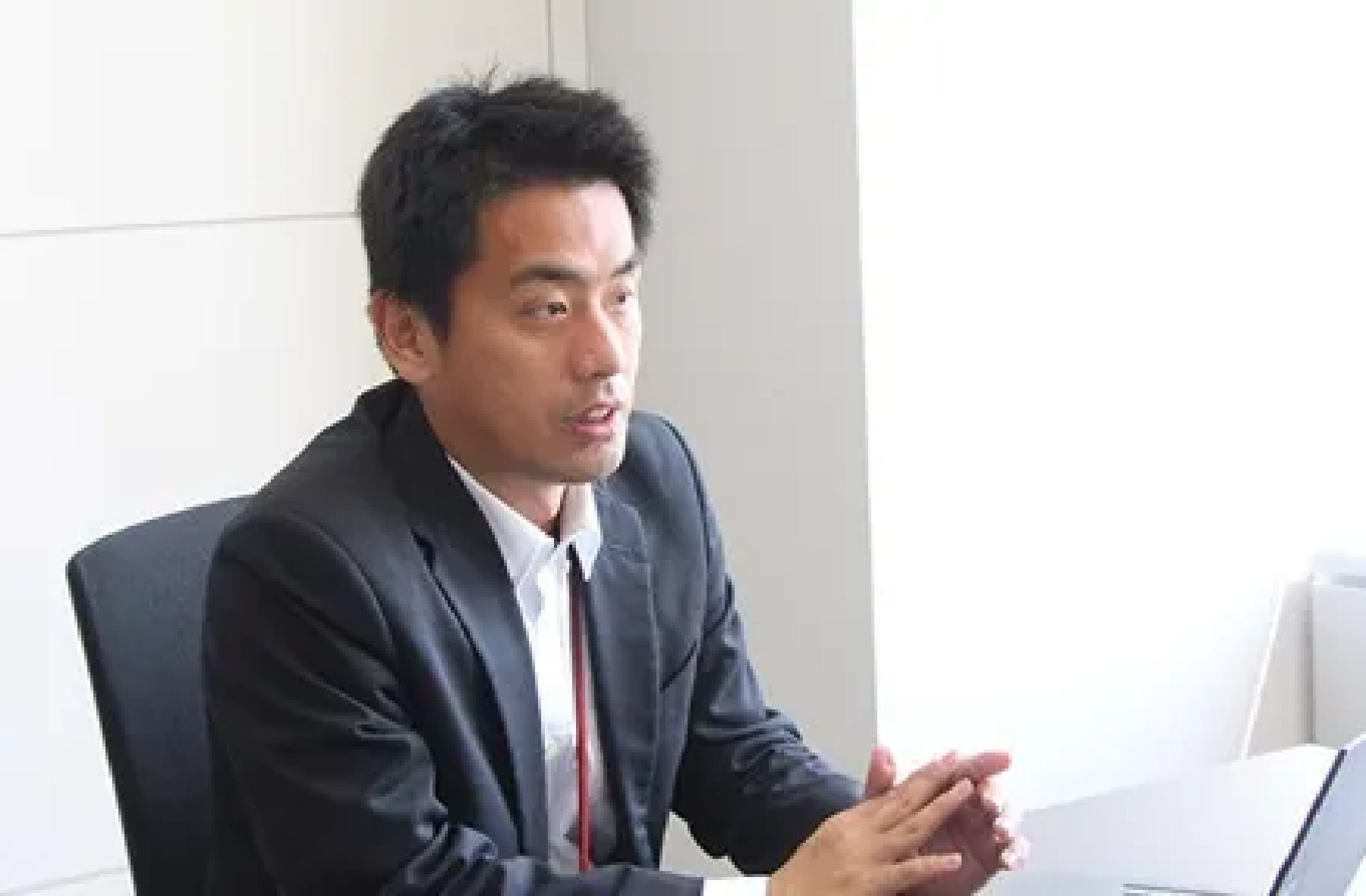 取材に答えるエネチェンジの担当者